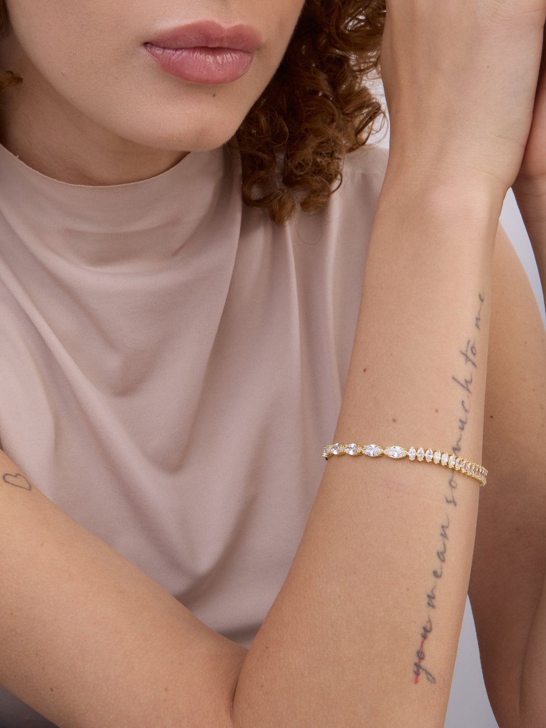 Pulseira banhada a ouro com zircónias