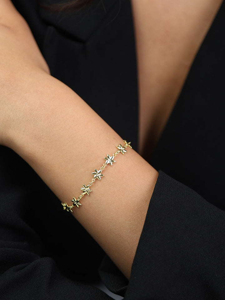 Pulseira flor banhada a ouro