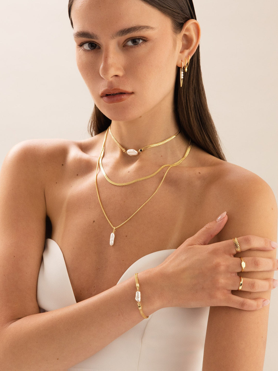 Pulseira de pérolas banhada a ouro