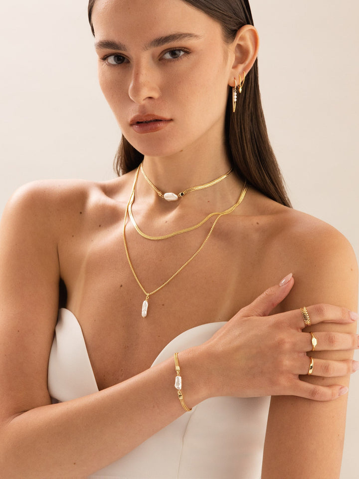 Pulseira de pérolas banhada a ouro