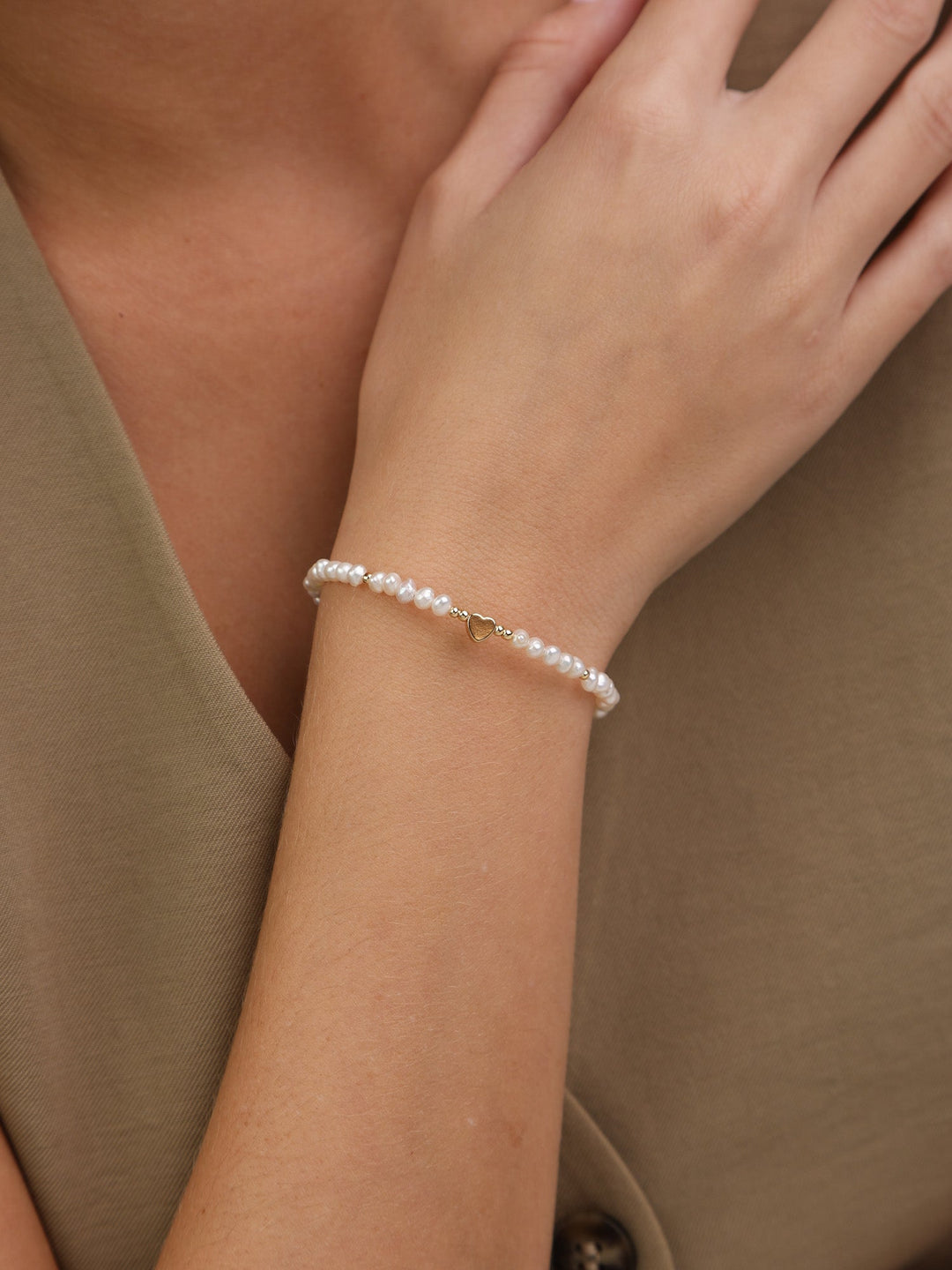 Pulseira de pérolas banhada a ouro