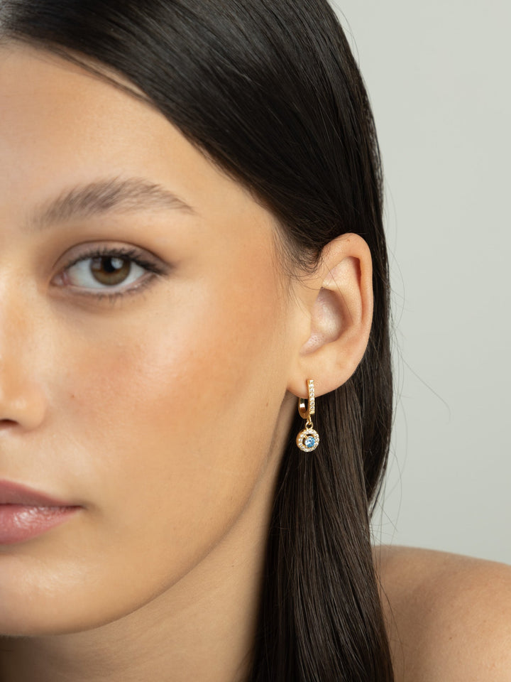 Pendentes banhados a ouro com zircónias transparentes e azul