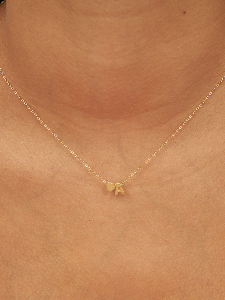 Fio com pendente "A" e coração banhado a ouro