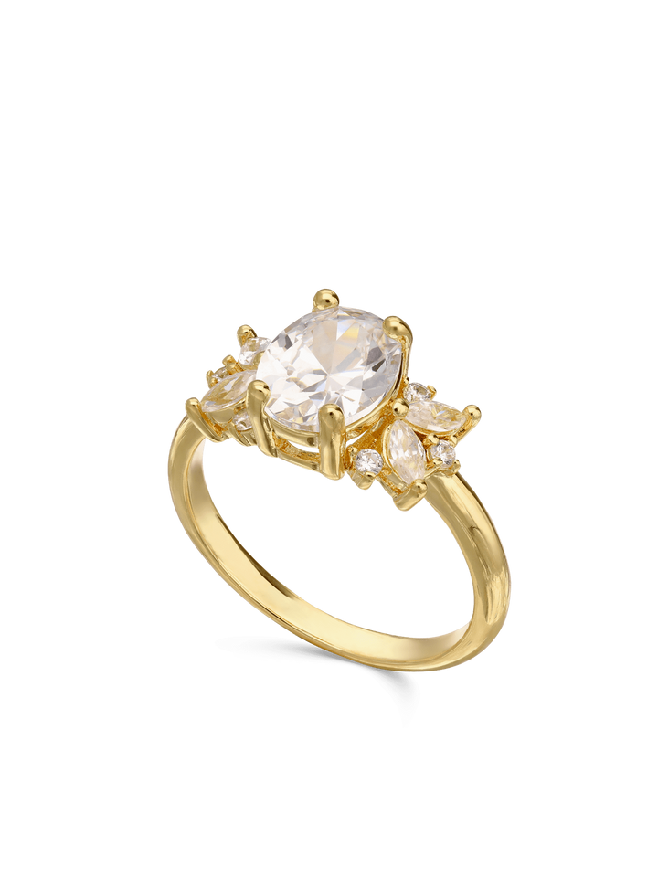 Anel banhado a ouro com zircónias transparentes